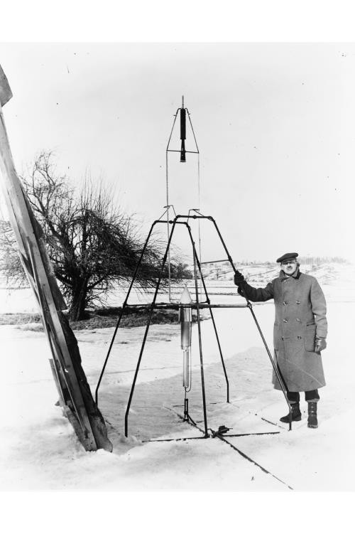 Scientist,possibly Dr. Robert H. Goddard,posed with Rocket,Inventor,c1925