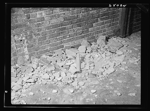 Photo:United States 1940s Civilian Defense Rubble Blast Damage Brick Wall
