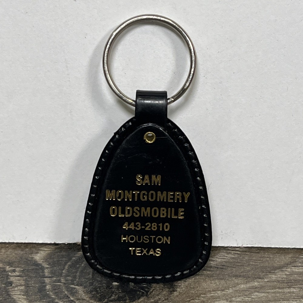 Sam Montgomery Oldsmobile Houston Texas Keychain Key Ring “The Rocket Man”