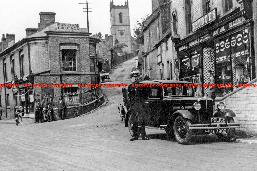 F006647 Ironbridge Shropshire St Lukes Church The policeman is standing by the c