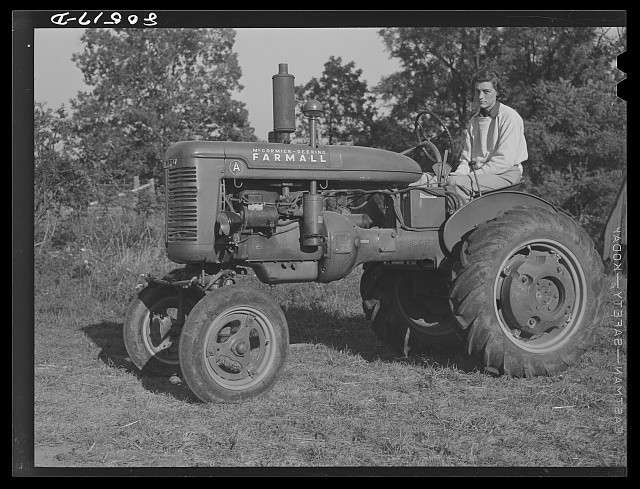 Photo:Haymarket Virginia 1941 Chicken Farm Owner on Farmall Tractor