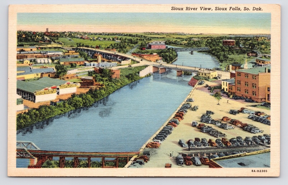 c1940s-Sioux Falls South Dakota SD~Aerial View~River~Bridge~Lumber Yard~Postcard
