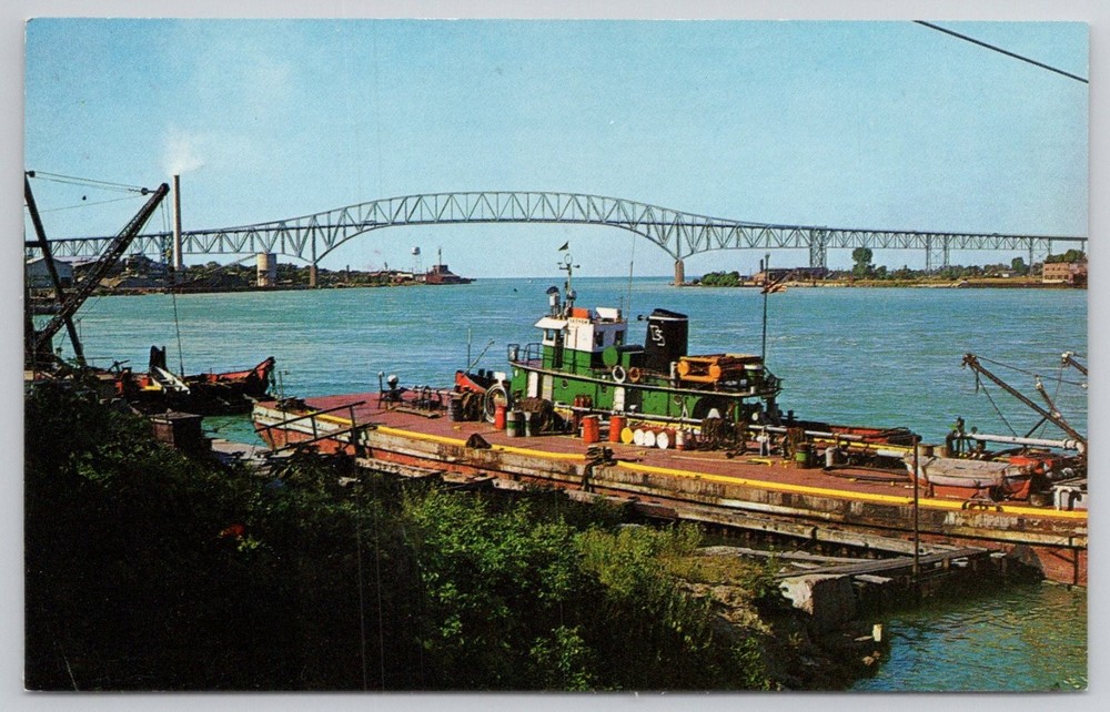 Port Huron MI Blue Water Bridge Tugboat St. Clair River Plastichrome Postcard