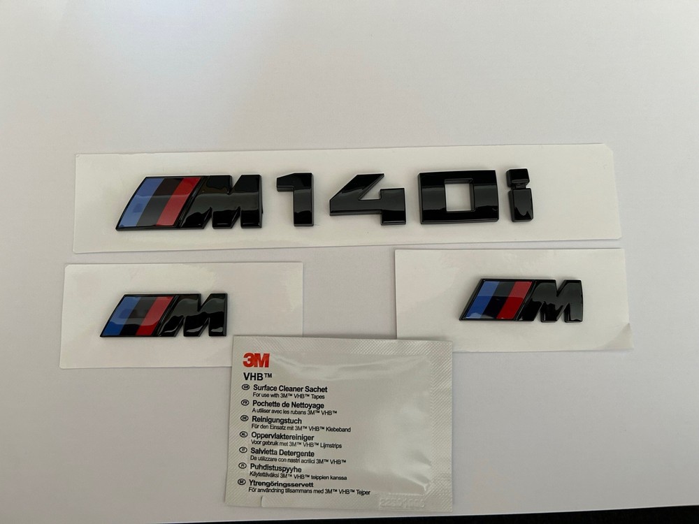 BMW M140i AND 2X M WING BADGES IN GLOSS BLACK. FREE ALCOHOL WIPE