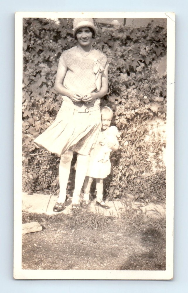 Old Vintage Photo WOMAN FLAPPER ERA HAT GIRL HOLDING TOY DOLL SHADOW SNAPSHOT