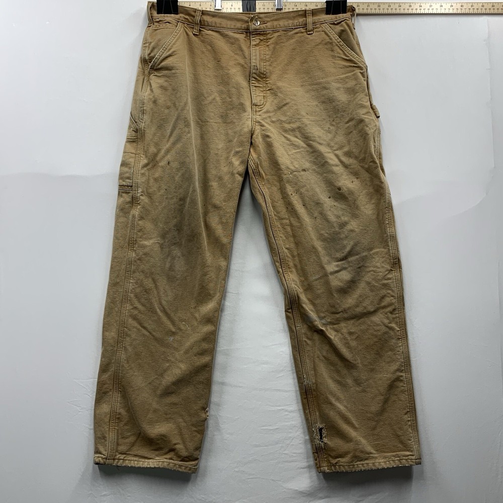 Брюки плотника Carhartt с фланелевой подкладкой 40 x 32 с искусственно состаренными отверстиями окрашенные B111 BRN