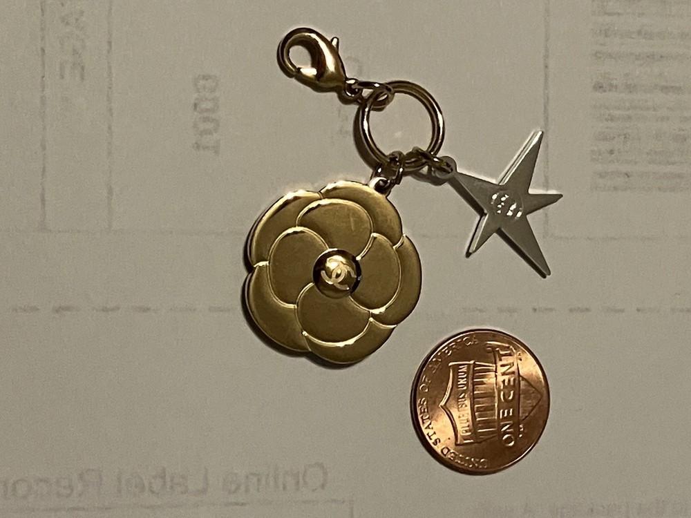CHANEL Holiday 2025 Camellia Flower Gold Charm w/ Small Comet Charm w/CC Logo