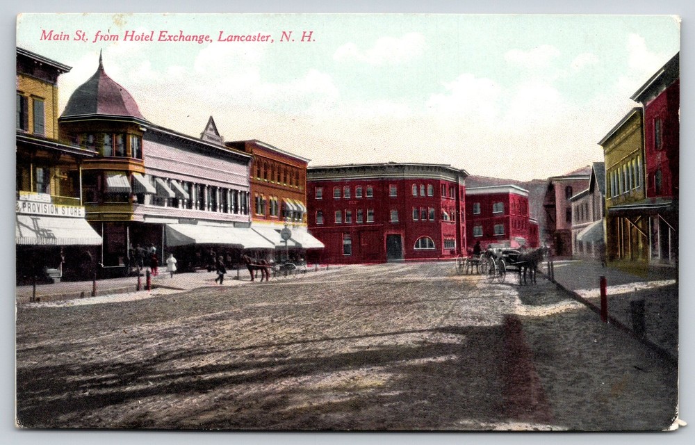 Lancaster NH~Main St View~Hotel Exchance~Carriage~Provision Store~c1910 Postcard