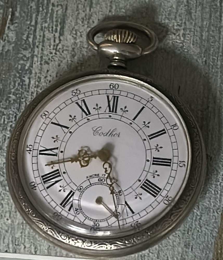 Elegant Antique Codhor Silver Pocket Watch with Roman Numerals & Engraved Case