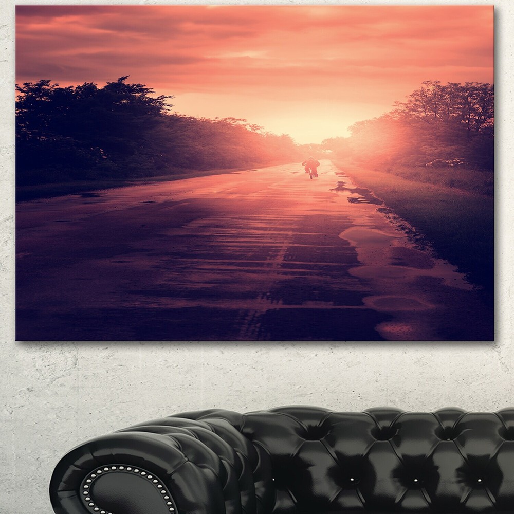Designart 'Vintage Biker at Sunset' Modern Landscape Wall Pink 32 in. wide x 16