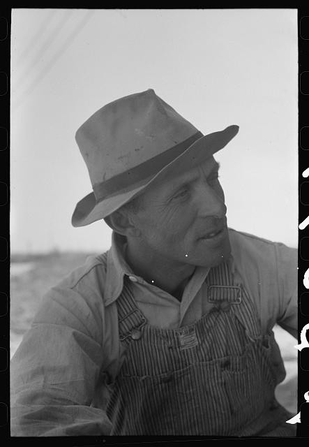 Photo:1930s Farmer in Overalls and Hat Portrait