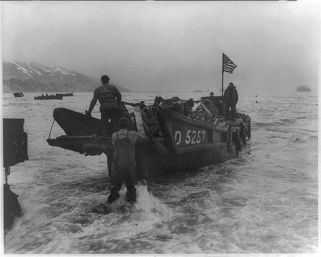 Attu Alaska 1943 GIs Carrying Wounded Stretcher Captured Japanese Landing Craft