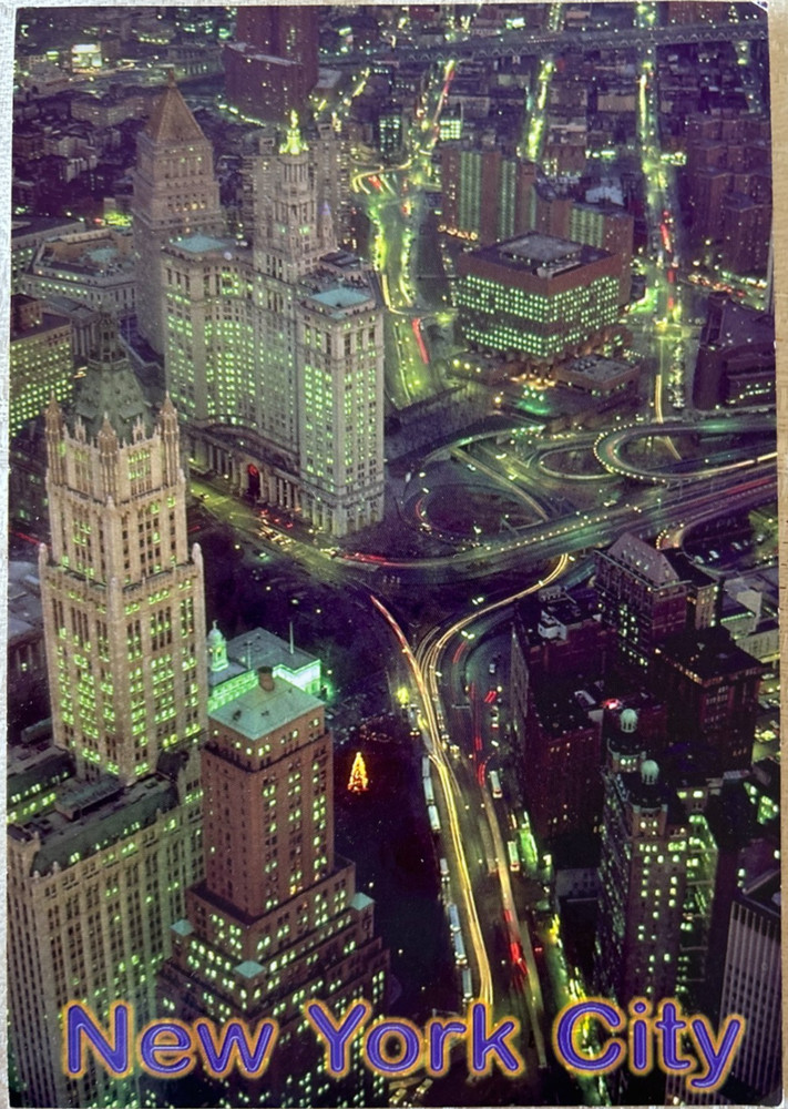 Postcard: Aerial night view-NYC City Hall, Woolworth, Municipal bldg, unposted