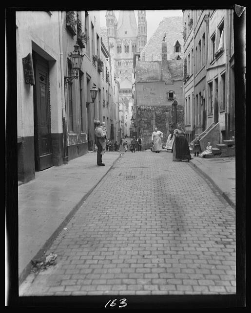 Photo:Europe Street Scene 1900s Cobblestone Alley Cathedral View