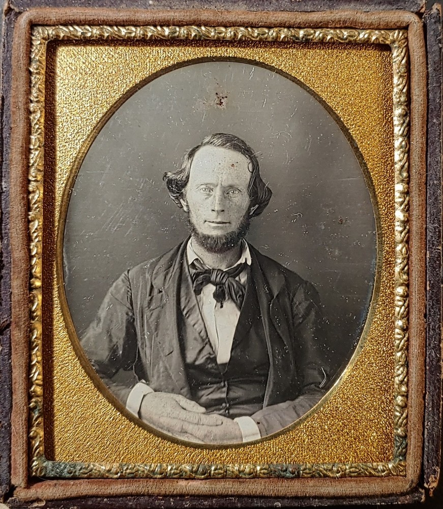 Antique 1/6 plate daguerreotype of a pleasant man - in half leatherette case.