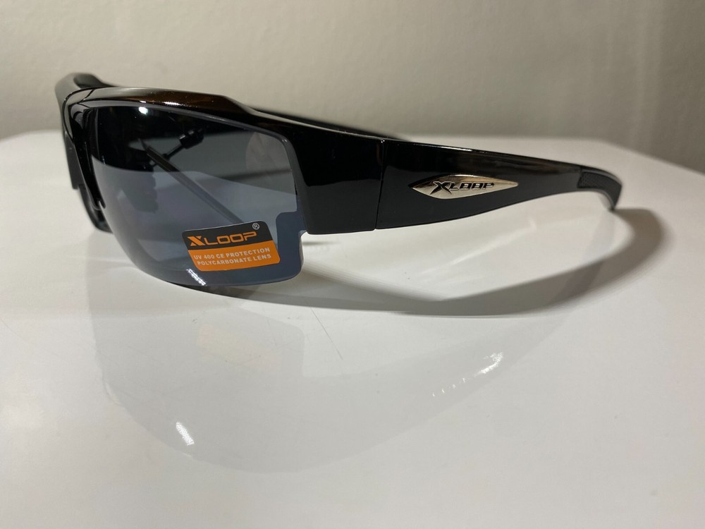 Men's black frame wrap sunglasses with smoke black lenses