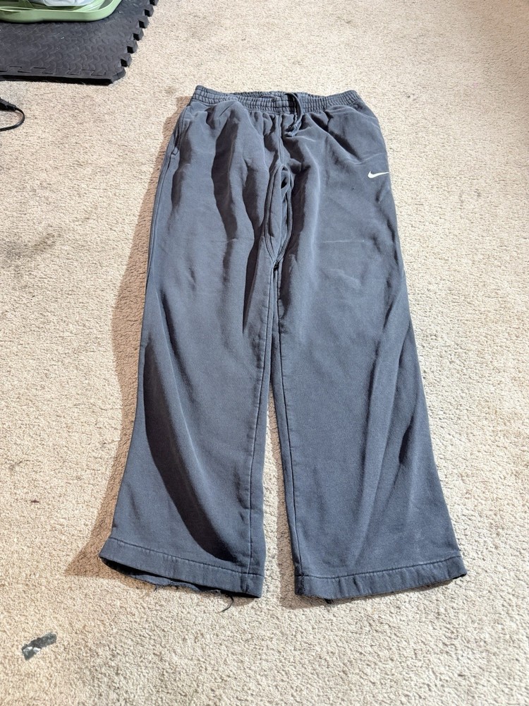 Y2K Nike baggy black sweatpants Size M beautiful fade with the blue tag Strings