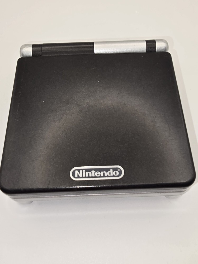 Gameboy Advance SP console with charger(Platinum and Onyx Limited Edition) Works