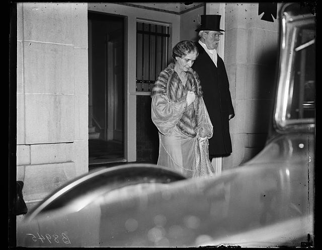 Photo:[Charles Evans Hughes, right, with wife]