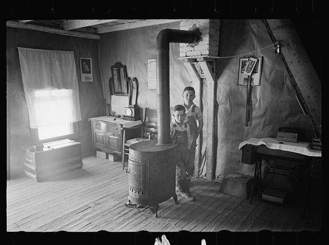 Photo:1930s Boys in Cabin Interior Wood Stove Rustic Room