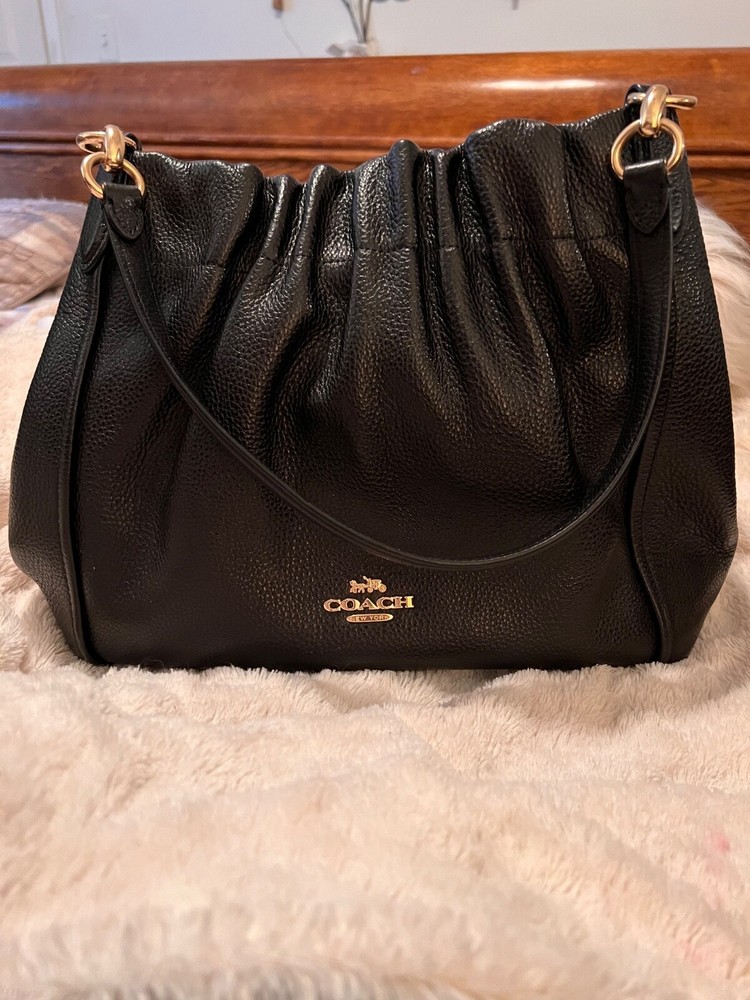 Coach Leather Handbag – Stylish & Timeless Designer Accessory