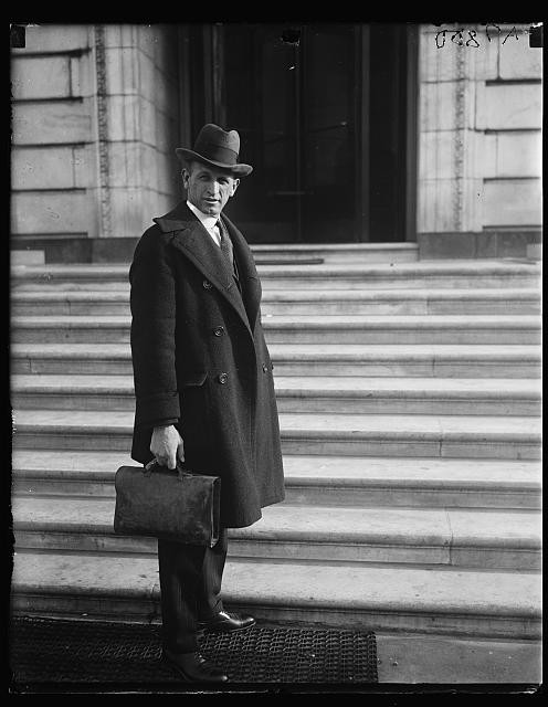 Photo:Man in Overcoat and Hat on Steps 1920s Briefcase Portrait