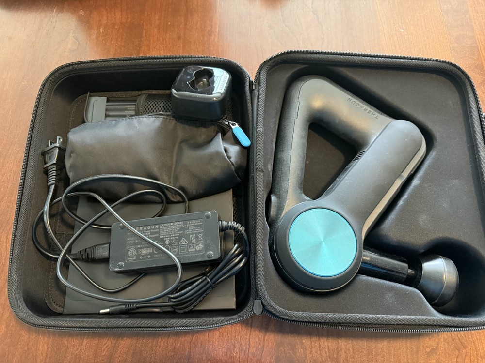 Theragun Therapeutic Messager Black - Nearly New With All Original Packaging