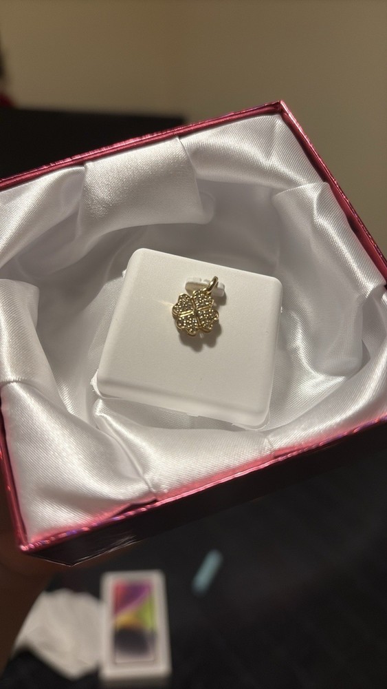 Elegant Gold Clover Pendant with Sparkling Diamond Accents