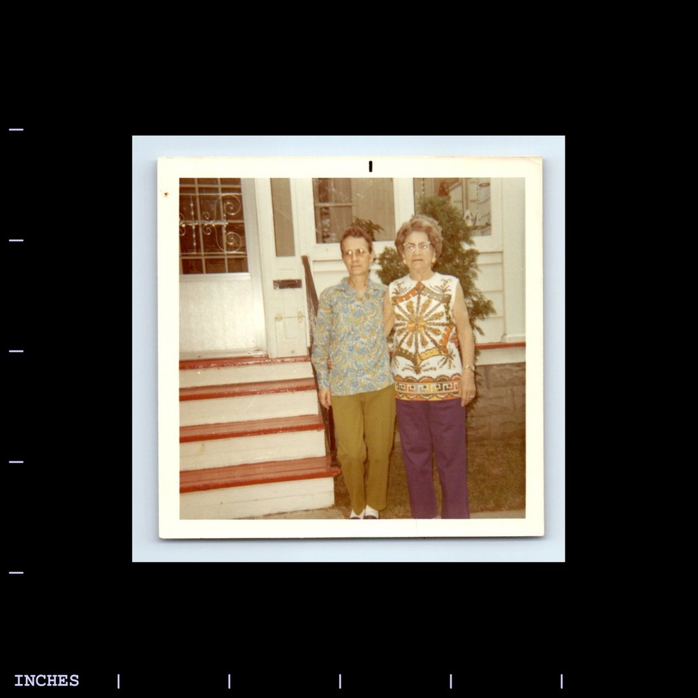 Square Color Photo WOMEN STANDING OUTSIDE HOUSE