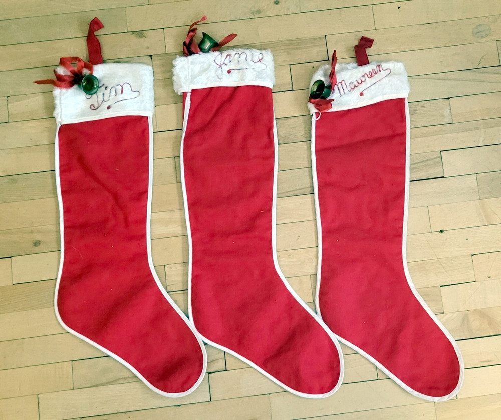 Three Red Flannel Stockings.  Decorated with Bells, Holly & Ribbon. 20