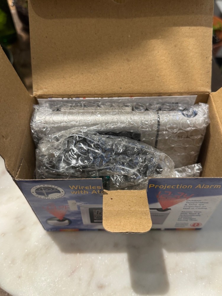 Wireless Weather Projection Alarm with Atomic Time, new in box never used