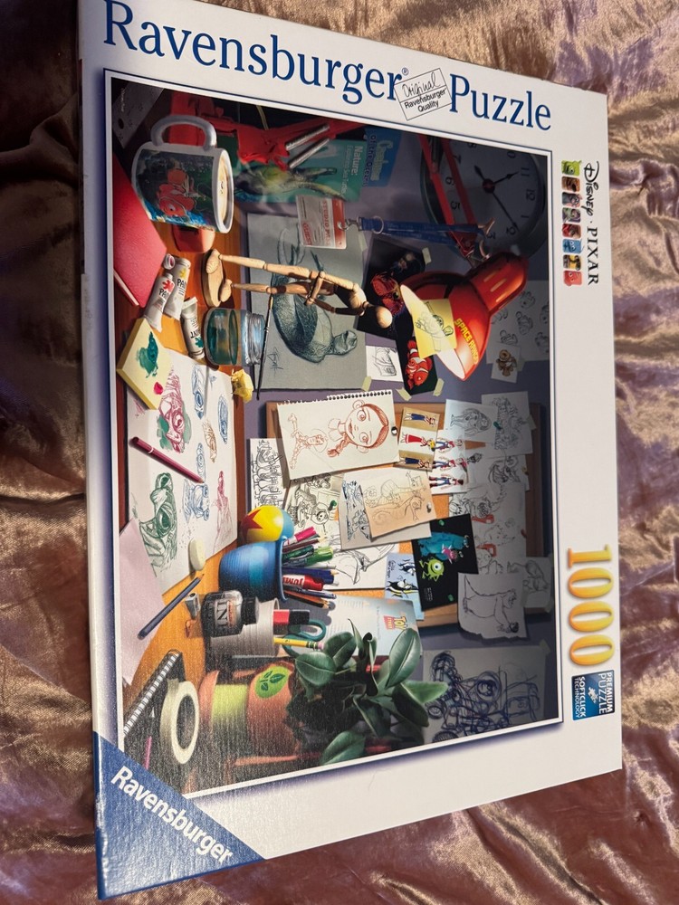 Ravensburger Disney Pixar. The Artist's Desk Puzzle 1000 Pieces.