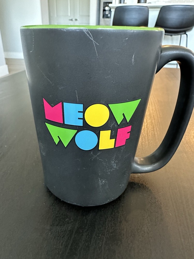 Meow Wolf Mug Black Green Inside Multicolor Logo Art Exhibit Coffee Cup
