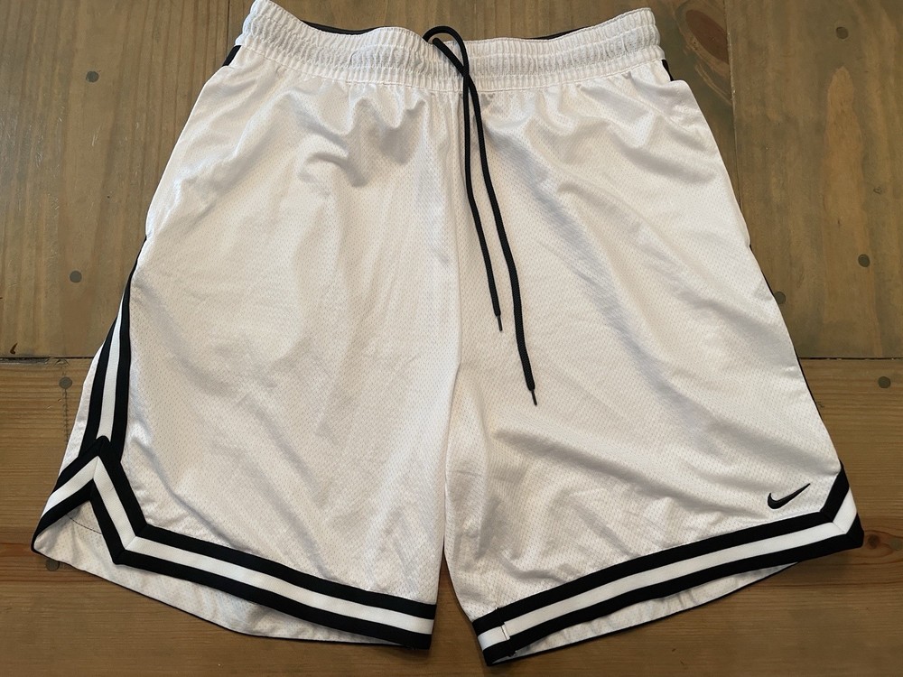 Nike Men’s large white basketball shorts with black stripes