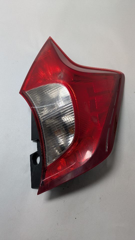 Used Right Tail Light Assembly fits: 2019 Nissan Versa quarter panel mounted Htb