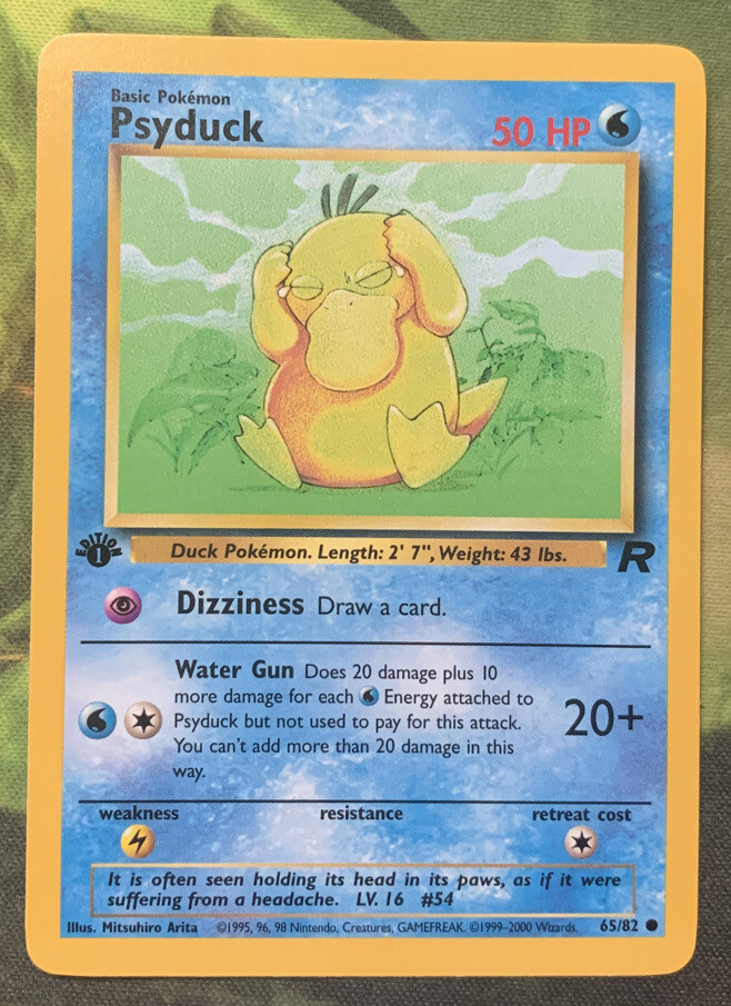 1st Edition Psyduck 65/82 - Team Rocket - Near Mint