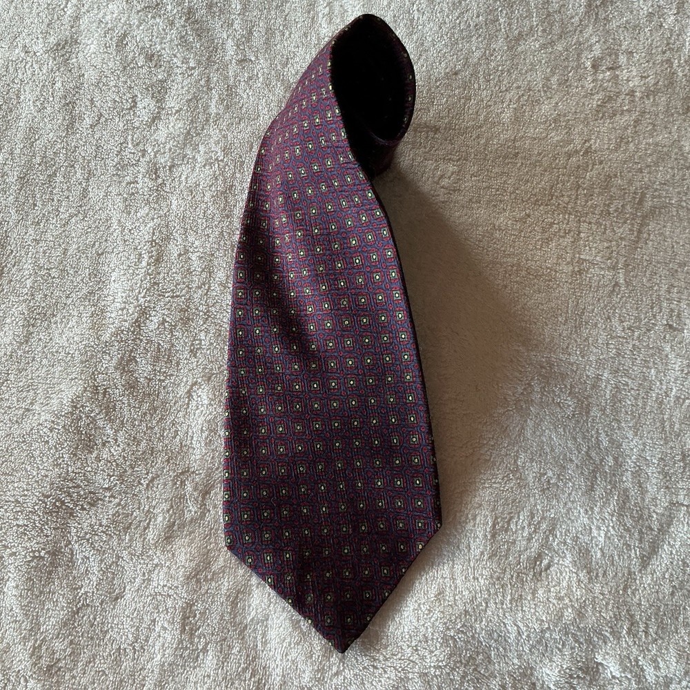 Polo Ralph Lauren 100% Silk tie small repeating medallions. Burgundy/navy/green.