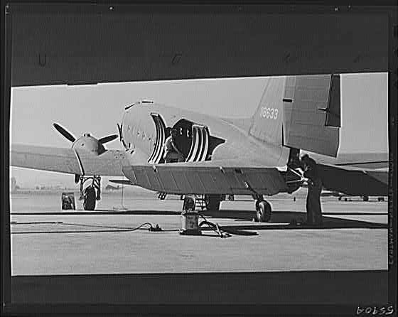 Photo:1940s Military Transport Plane on Airfield Open Cargo Door
