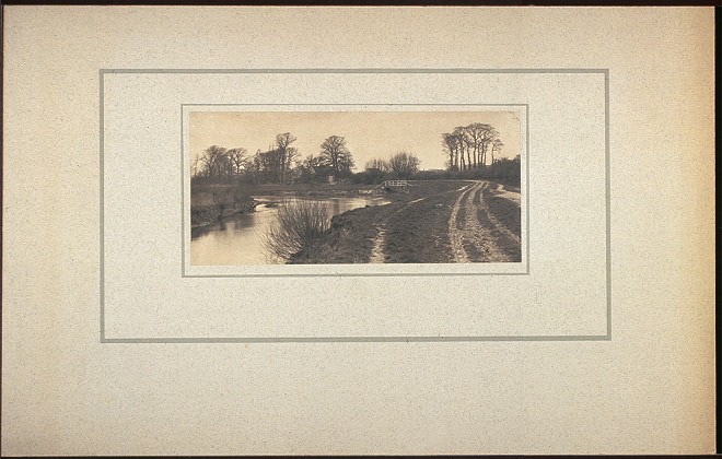 1895 Kelmscott Manor from the river (country house of William Morris)