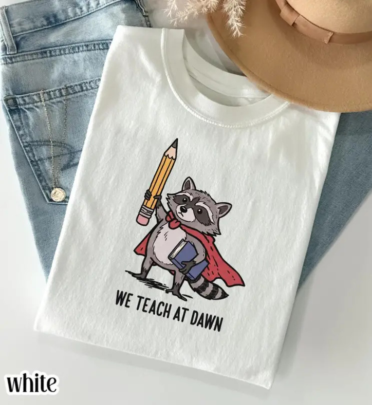 Funny Raccoon Teacher Shirt We Teach At Dawn Back To School Graphic Tee