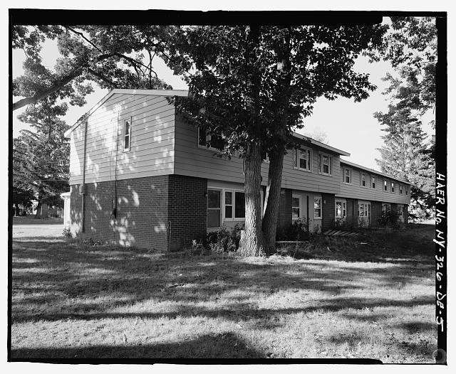 SOUTHEAST (REAR) AND SOUTHWEST (SIDE) ELEVATIONS OF BUILDING. VIEW TO NORTH. -
