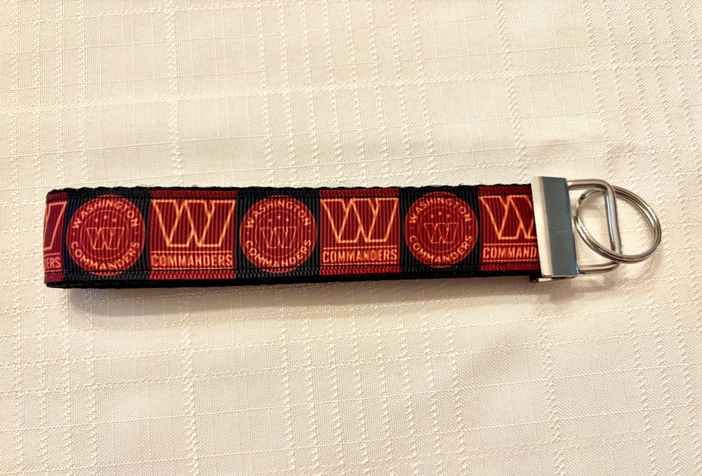 Handmade Washington Commanders keychain wristlet with ribbon decor
