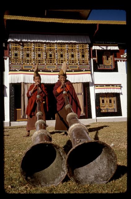 Photo:Gangtok Sikkim India 1969 Tsuklakhang Temple boys blowing gyalings