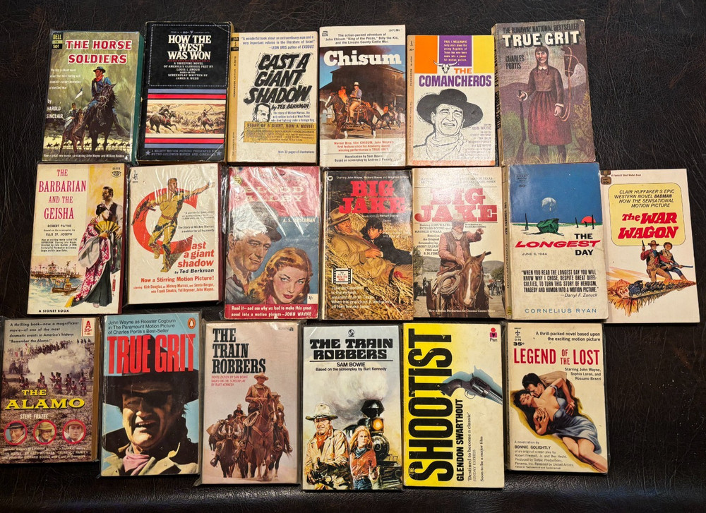 19 John Wayne movie tie-in paperbacks 1950s on VG Chisum-Big Jake-War Wagon etc