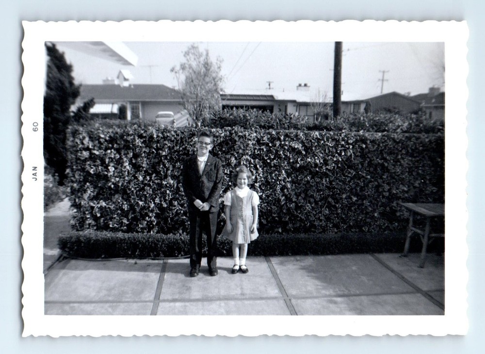 Old Vintage Photo BOY WITH GLASSES GIRL OUTSIDE HOUSE IN YARD 1960 SNAPSHOT