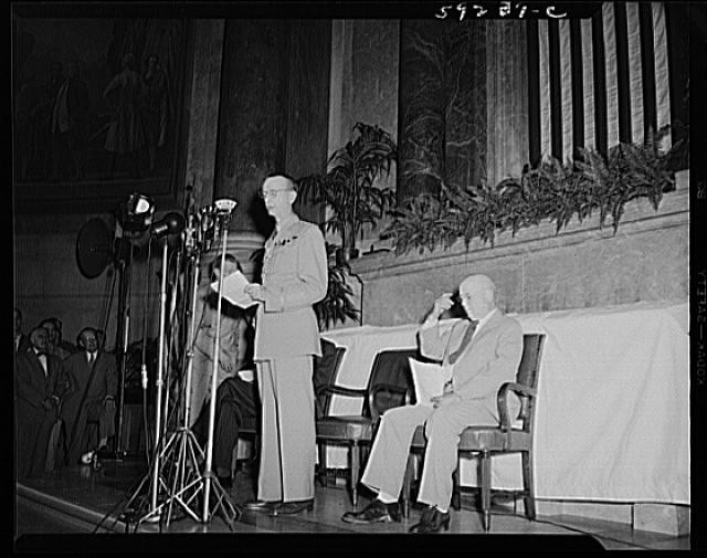 Photo:Washington DC 1940s Speech at Microphones Seated Man in Hall