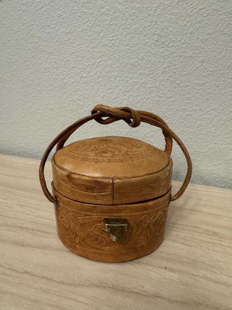 Hand tooled leather oval box purse circa Bag Collection