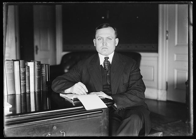 Photo:Man Portrait at Desk 1900s Suit Books Office Photograph