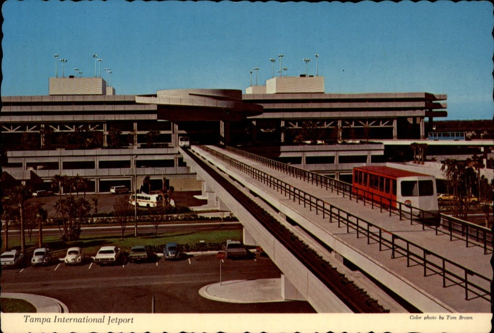 Tampa Florida International Jetport Terminal shuttle cars ~ vintage postcard