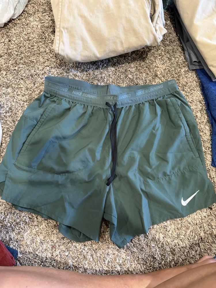 2 Nike Men's Running Shorts. One Green, One black